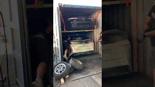 40” container loading w 4 cars and parts