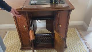 Singer 201k treadle and hand crank sewing machine in cabinet SOLD