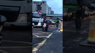 Rare Bright green Mercedes dump truck on busy London road