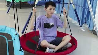 blue boat swing and red nest swing for children