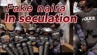 Braking news fake naira in seculation as federal government redesigns the new notes