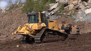 CAT D6N | Pushing ditching material in a quarry