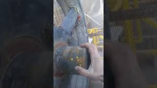 Rolling the Bradley Pulverizer mill over by climbing on the driven pulley