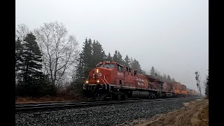 CPKC 101 hammering across the frog in the fog at Marathon, ON