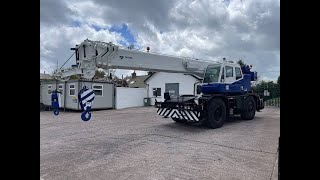 A small winch lifts a much larger load.