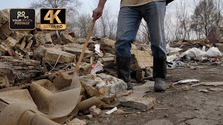 Male walking at garbage dump | Homeless man - Royalty Free by YOUR STOCK FOOTAGE