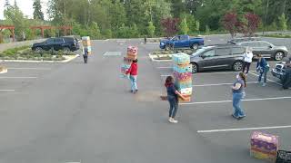 Jean Wong Wu Antics. Box race at the end of the day of distributing groceries