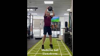 Medicine ball slam downs. Upper body push power exercise