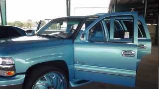 Outrageous Tahoe on  28" Davin TWSTD, Candy Teal Cadillac on 26" DUB Swyrls