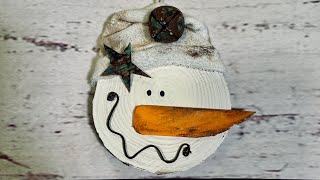 Vintage wood slice snowman