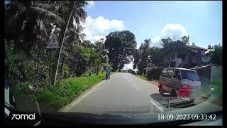 A biker waiting to turn, might turn