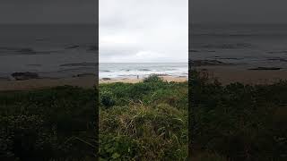 Mama praying near the sea