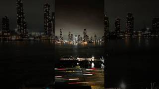 A night time view of mid-town, Manhattan across the East River from 34 Street NY, United States.