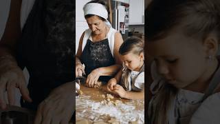 Family photoshoot at the kitchen | grandmother with her granddaughter baking cookies