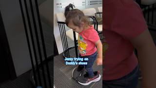 Cute Jazzy trying on Daddy’s big shoes 😁 #cute #toddler #viralvideo