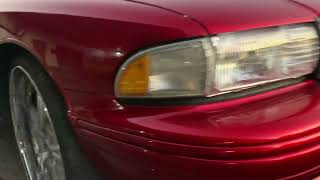 CANDY RED 96 IMPALA SITTING ON 26’s