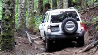 Modified Chevy Tracker at Evan's Creek getting twisted up on some trails