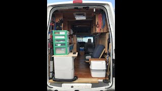 Nissan NV 2500 High Roof Camper w/fold down bed & mini-couch