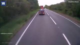 TitleReckless 4X4 driver almost crashes head first while overtaking