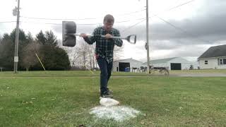 Beating A Milk Jug With A Shovel