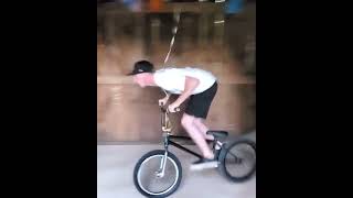 bmx on the smallest indoor mini ramp