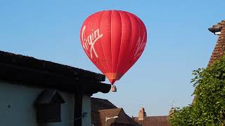 Headcorn, hot air balloon almost down over the village, June 2024.