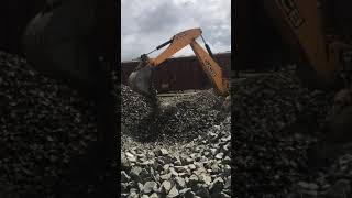 JCB 4DX Backhoe working at a railway station