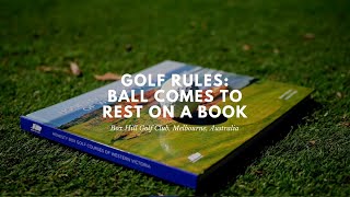 Golf Rules: Golf Ball Comes to Rest on a Book