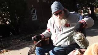 DSCN6405Tim West sings Cajun song on Fayetteville AR town square