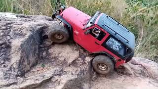 scx10 ii rubicon jk wrangler short crawling with drop shock setup.