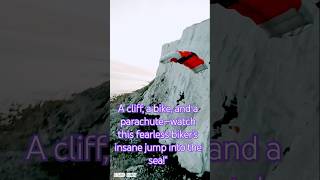 Biker’s Daring Cliff Jump into Sea with Perfect Parachute Landing!#CliffJump #ExtremeStunt #BikeJump