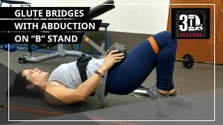 Glute Bridges with abduction on “B” stand