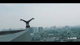 Chinese Dancing on the High Building to Challenge the Extreme Sport