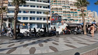 A procession of Bikes and flash cars get the attention of Levante beach Benidorm