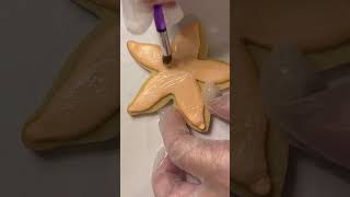 Starfish Cookies to complete the beach wedding set #sanddollar #royalicing #shorts #starfishcookies