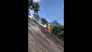 Monk Climbing Barefoot on Cliff – A True Test of Strength & Balance #BarefootClimbing #MonkLife