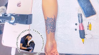 Arm flower tattoo