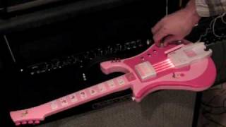 Circuit Bent Barbie Guitar with Microphone Input Feedback