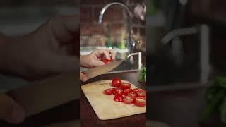 Cutting juicy cherry tomatoes