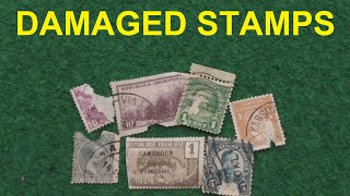 Searching through a packet of damaged stamps #philately #stamps