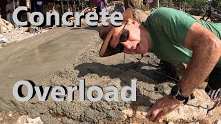 Luke Damant's dad uses half a ton of cement to build a concrete slab at a remote Filipino village