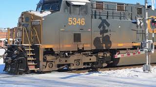 Deshler with snow in February 2024. GE power from CSX, UP and KCS and a few EMDs