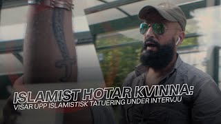 Islamist hotar kvinna på bussen: visar upp islamistisk tatuering