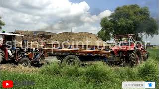 Belarus tractor with heavy loaded truly in mud of the stuck of pulling out & very powerful tractor