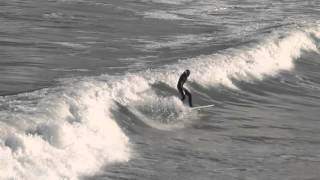 Surfer this morning in sunshine at towan