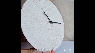 White artistic wall clock