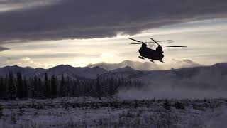 Canadian CH-147 Chinooks Fly Spartan Paratroopers