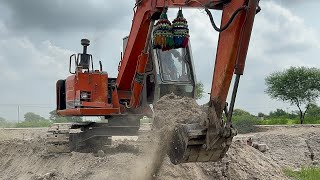 Excavator & Trolley in Action