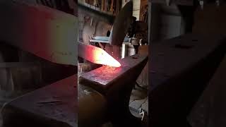 Drawing out big bar in slow motion, wait til the end to see real time action. #blacksmith #anvil