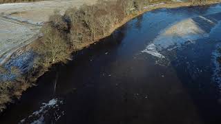 Icy river Dee and wire suspension bridge aberdeenshire scotland dji mini drone